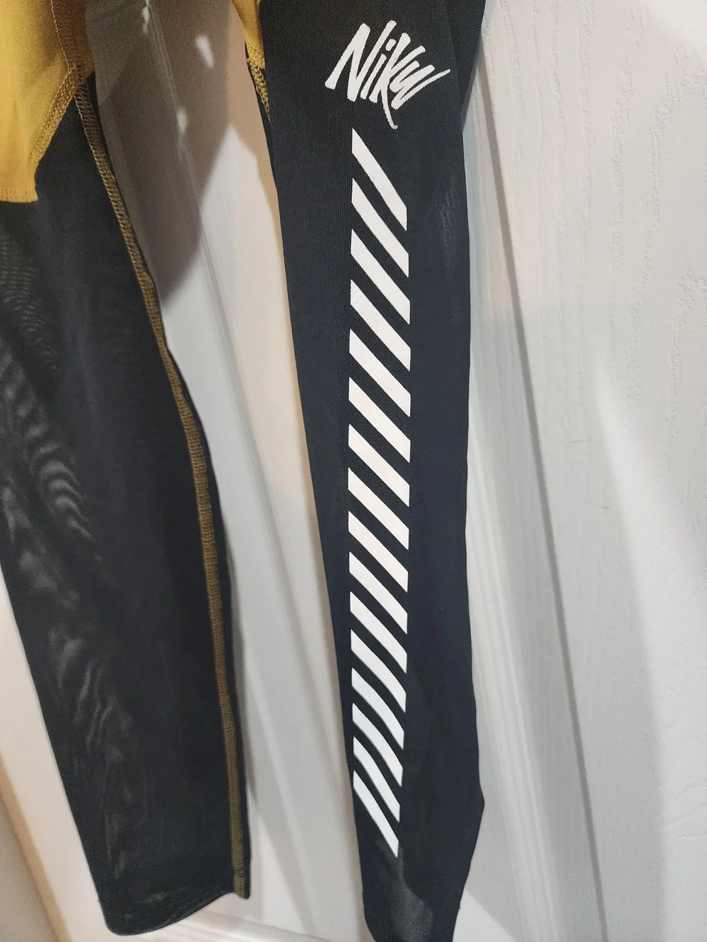 Nike Womens Mustard and Black Performance Leggings with White Stripe